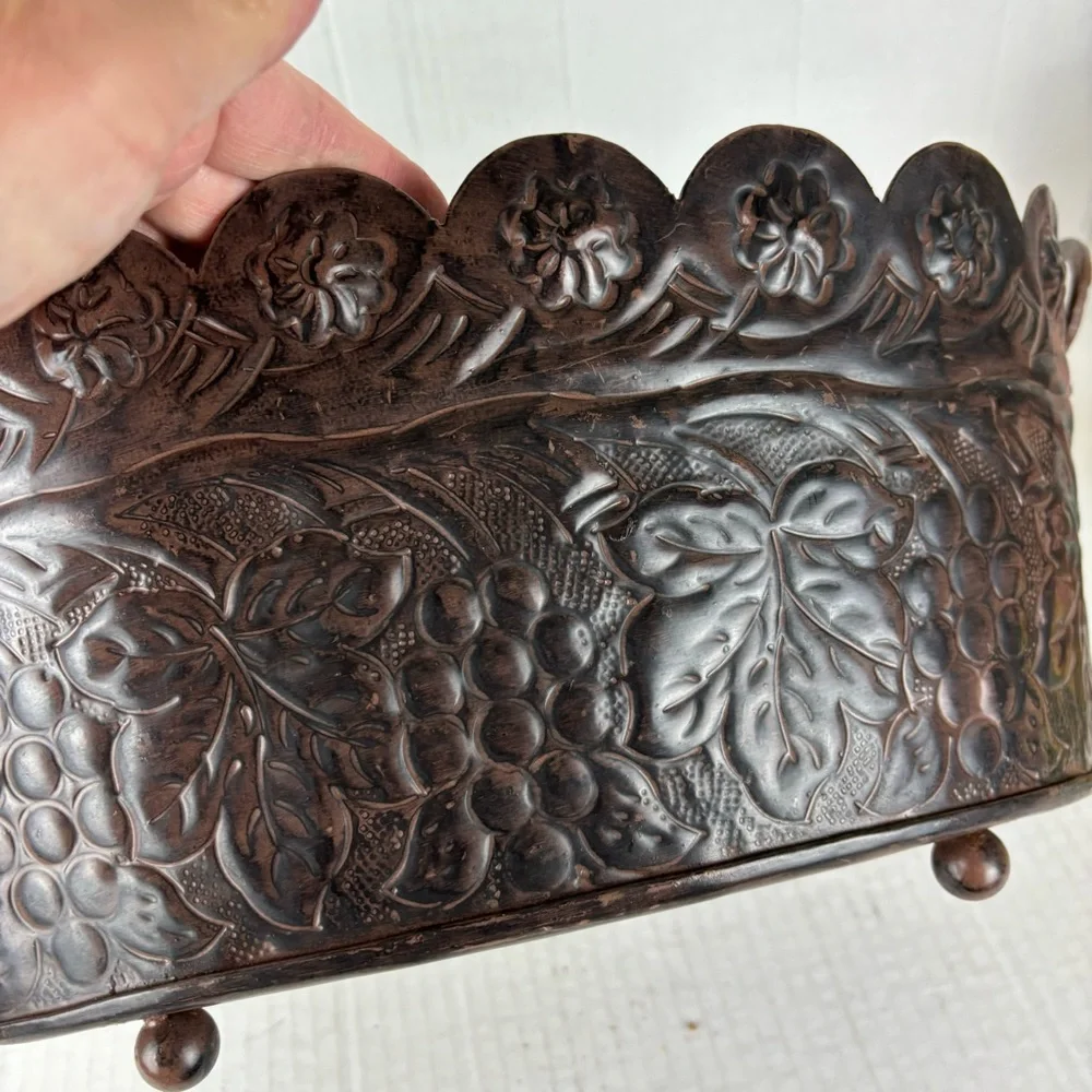 Metal oval planter/basket with scalloped edge and embossed design